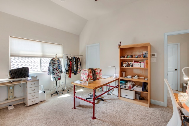 carpeted office with baseboards and lofted ceiling