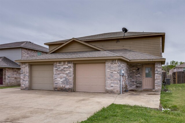 813 E College St, Princeton, TX 75407 - view of front of property with a shingled roof, concrete driveway, a garage, and brick siding