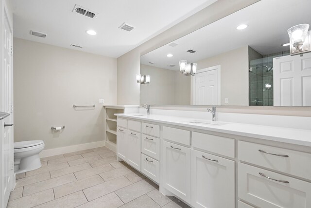 5948 Melshire Dr, Dallas, TX 75230 - bathroom featuring double vanity, a shower stall, tile patterned floors, and recessed lighting