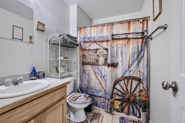 bathroom featuring tile patterned floors, vanity, a shower with curtain, and toilet