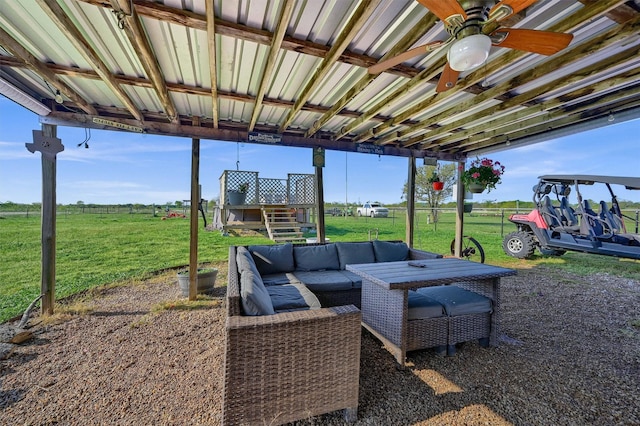 view of patio with outdoor lounge area, a ceiling fan, and fence