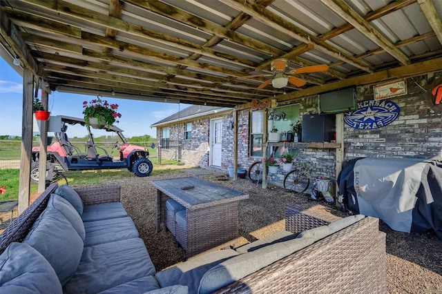 view of patio / terrace featuring ceiling fan and a grill