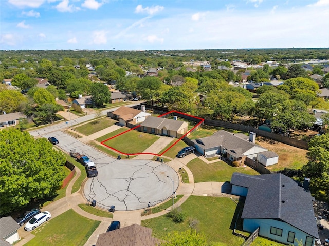 birds eye view of property with a residential view