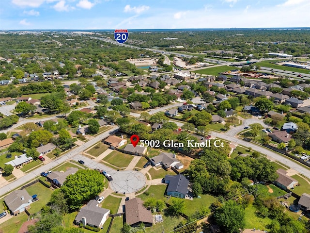 birds eye view of property with a residential view