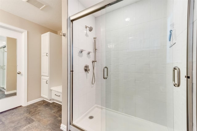 full bath featuring a shower stall