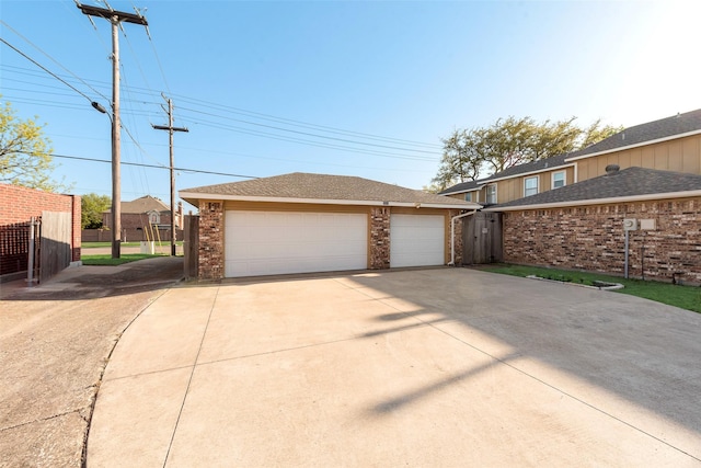 detached garage with fence