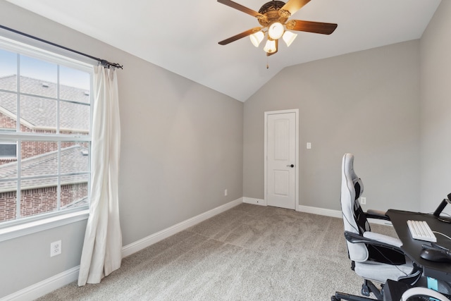 office with light carpet, ceiling fan, vaulted ceiling, and a wealth of natural light