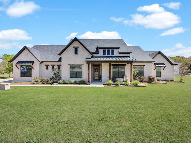 1005 Forest Glen Rd, Weatherford, TX 76087 - view of front of home with a standing seam roof, a front lawn, and roof with shingles