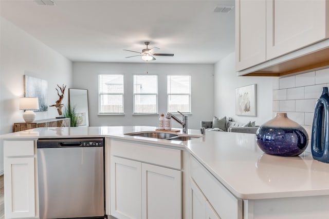 kitchen with dishwasher, a sink, visible vents, a ceiling fan, and open floor plan