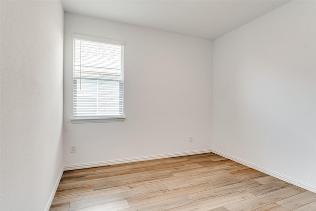 1005 Manuel Dr, Fate, TX 75087 - unfurnished room with light wood-style flooring and baseboards