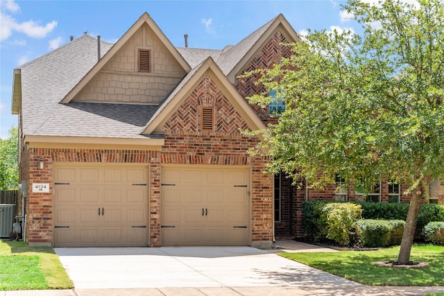 4134 Lee Hutson Dr, Sachse, TX 75048 - view of front facade with an attached garage, a shingled roof, driveway, and brick siding