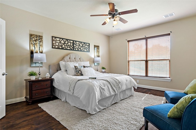 4134 Lee Hutson Dr, Sachse, TX 75048 - bedroom with dark wood-type flooring, visible vents, baseboards, and a ceiling fan
