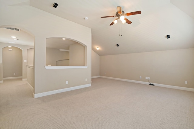 4134 Lee Hutson Dr, Sachse, TX 75048 - unfurnished room featuring baseboards, vaulted ceiling, light carpet, visible vents, and ceiling fan