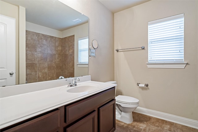 4134 Lee Hutson Dr, Sachse, TX 75048 - bathroom featuring vanity, baseboards, tile patterned flooring, toilet, and visible vents