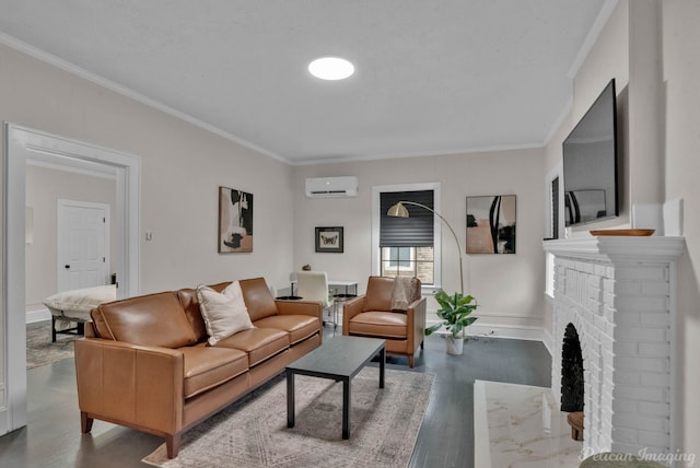 living area with baseboards, a brick fireplace, a wall mounted AC, crown molding, and wood finished floors