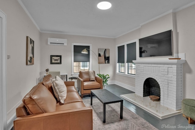 living area with crown molding, baseboards, a wall mounted AC, and a brick fireplace