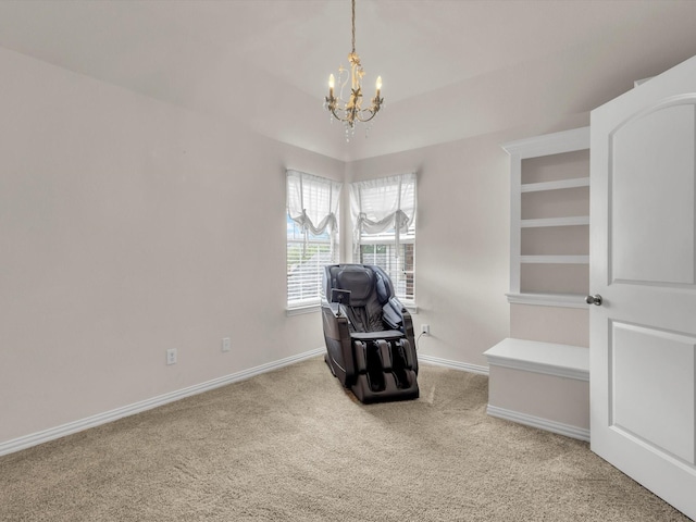 living area featuring baseboards, carpet flooring, and a notable chandelier
