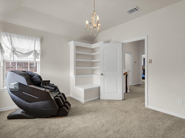 sitting room with visible vents, baseboards, a notable chandelier, vaulted ceiling, and light carpet