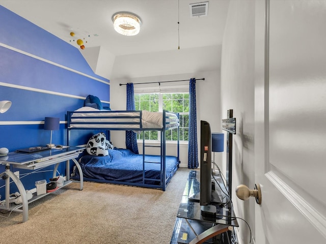 carpeted bedroom with visible vents