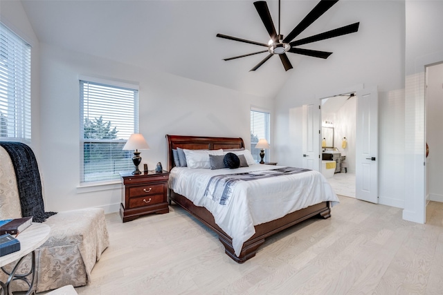 bedroom with baseboards, light wood-type flooring, ceiling fan, and high vaulted ceiling