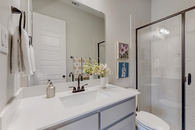 2801 Capitol Pl, Melissa, TX 75454 - bathroom with vanity, a shower stall, toilet, and visible vents