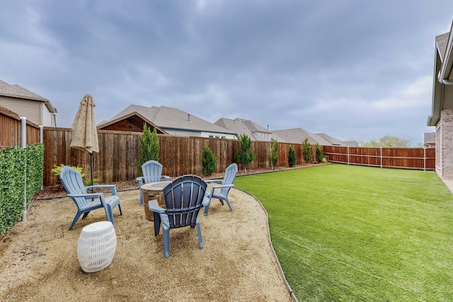 2801 Capitol Pl, Melissa, TX 75454 - view of yard featuring a fenced backyard and an outdoor fire pit