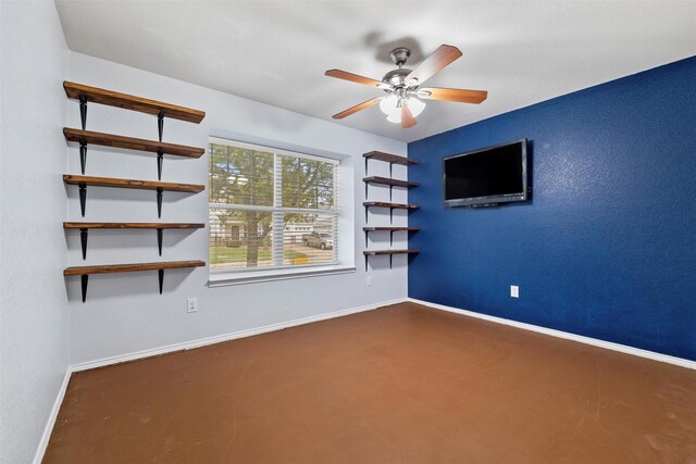 117 Independence Ave, Venus, TX 76084 - unfurnished room with baseboards, ceiling fan, and finished concrete flooring