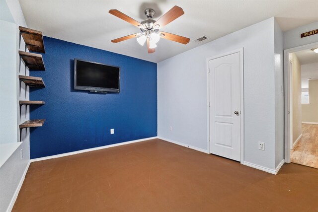 117 Independence Ave, Venus, TX 76084 - unfurnished bedroom with baseboards, a ceiling fan, and finished concrete flooring