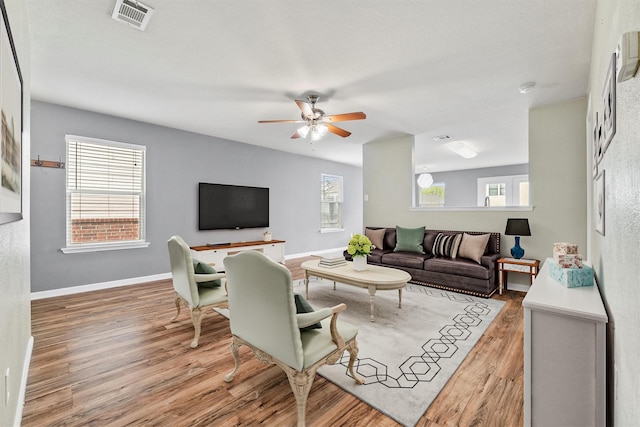 117 Independence Ave, Venus, TX 76084 - living area with light wood-style floors, ceiling fan, and baseboards