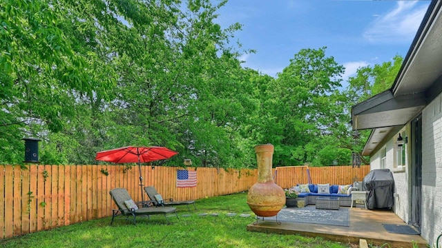 1210 Carla Dr, Denison, TX 75020 - view of yard featuring outdoor lounge area, a patio, and view of wooded area