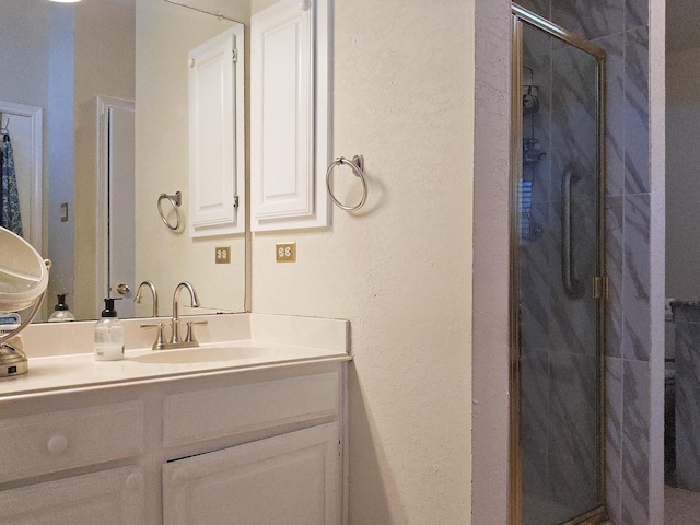 1317 Swiss Ct, Plano, TX 75023 - full bath featuring a stall shower, vanity, and a textured wall