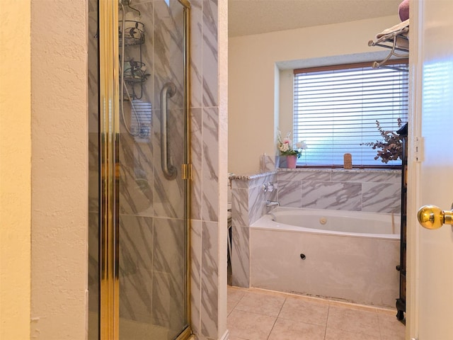 1317 Swiss Ct, Plano, TX 75023 - bathroom with a shower stall, tile patterned floors, and a garden tub