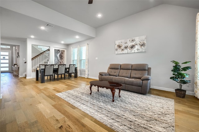4008 Rochelle St, Celina, TX 75009 - living room featuring stairway, light wood finished floors, vaulted ceiling, baseboards, and recessed lighting