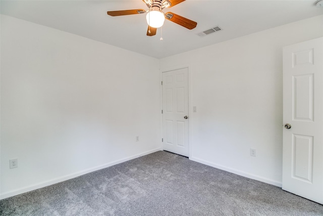 309 W Monterey St, Denison, TX 75020 - carpeted spare room featuring visible vents, baseboards, and a ceiling fan