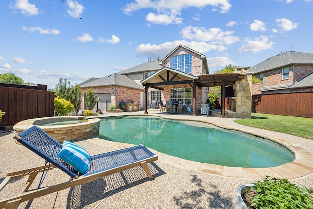 9892 Ranchero Dr, Frisco, TX 75033 - view of pool with a pergola, a patio area, a pool with connected hot tub, and a fenced backyard