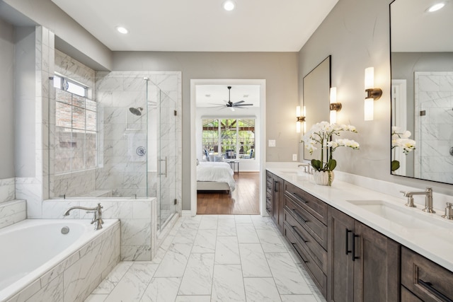 9892 Ranchero Dr, Frisco, TX 75033 - ensuite bathroom with connected bathroom, a shower stall, a bath, ceiling fan, and a sink