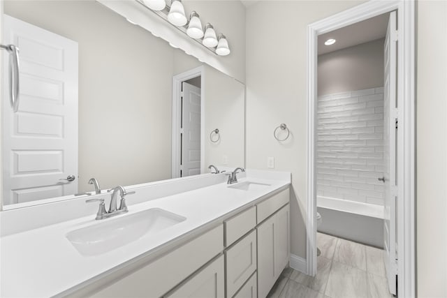 3723 Lochwood Dr, Rowlett, TX 75088 - bathroom featuring marble finish floors, toilet, and double vanity