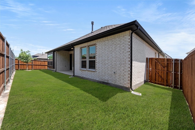 3723 Lochwood Dr, Rowlett, TX 75088 - rear view of property with brick siding
