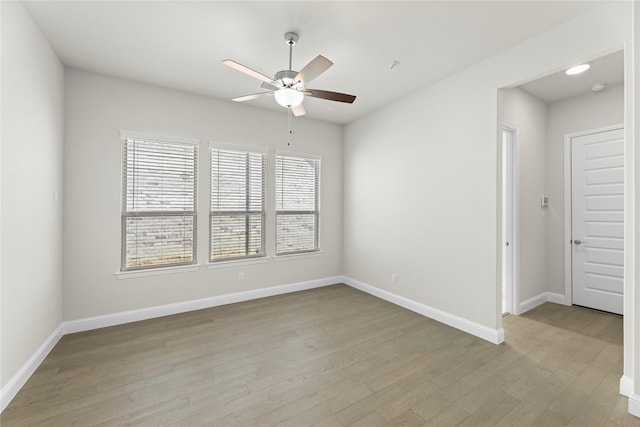3723 Lochwood Dr, Rowlett, TX 75088 - empty room with a ceiling fan, light wood-type flooring, and baseboards
