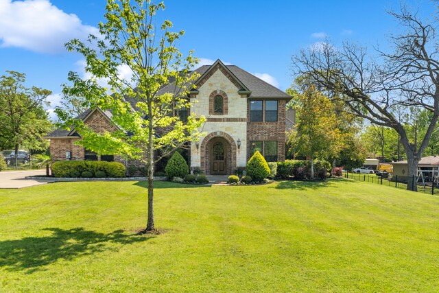 106 E Fork Rd, Sunnyvale, TX 75182 - french country inspired facade featuring stone siding and brick siding