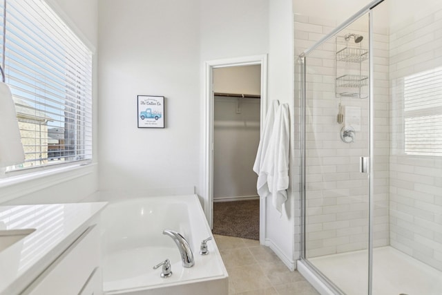 13412 Cortes De Pallas Dr, Little Elm, TX 75068 - bathroom with a stall shower, a garden tub, and tile patterned flooring