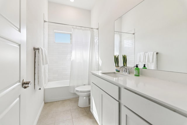13412 Cortes De Pallas Dr, Little Elm, TX 75068 - full bathroom featuring toilet, vanity, tile patterned floors, shower / bath combo with shower curtain, and baseboards