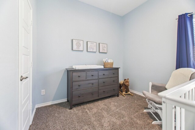 13412 Cortes De Pallas Dr, Little Elm, TX 75068 - carpeted bedroom with a crib and baseboards
