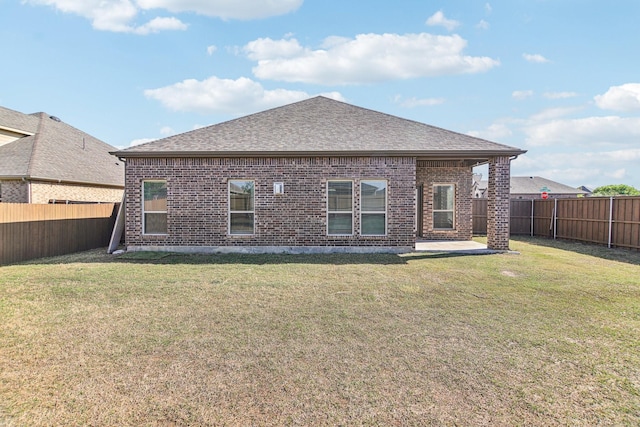 13412 Cortes De Pallas Dr, Little Elm, TX 75068 - back of house with brick siding, roof with shingles, and a patio