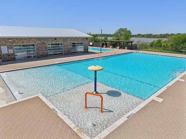 13412 Cortes De Pallas Dr, Little Elm, TX 75068 - community pool featuring fence and a patio