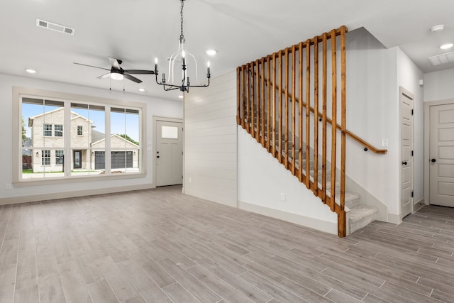 5703 Barkridge Dr, Granbury, TX 76048 - interior space with wood finished floors, an inviting chandelier, visible vents, and recessed lighting