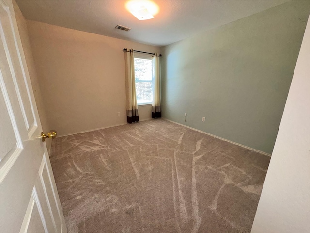 132 Yosemite Ln, Terrell, TX 75160 - carpeted empty room with baseboards