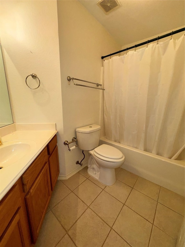 132 Yosemite Ln, Terrell, TX 75160 - bathroom with toilet, tile patterned flooring, vanity, shower / bath combo, and vaulted ceiling