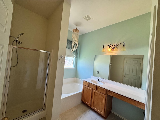 132 Yosemite Ln, Terrell, TX 75160 - full bath featuring a stall shower, a bath, vanity, and tile patterned floors