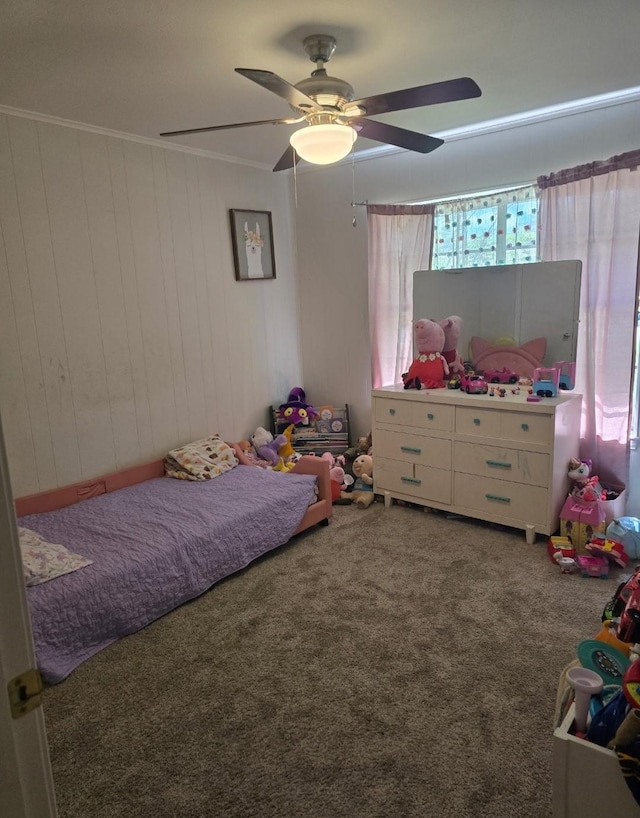 221 Azalea Dr, Sulphur Springs, TX 75482 - bedroom with carpet, ceiling fan, and wooden walls